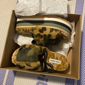 Never worn; in original box